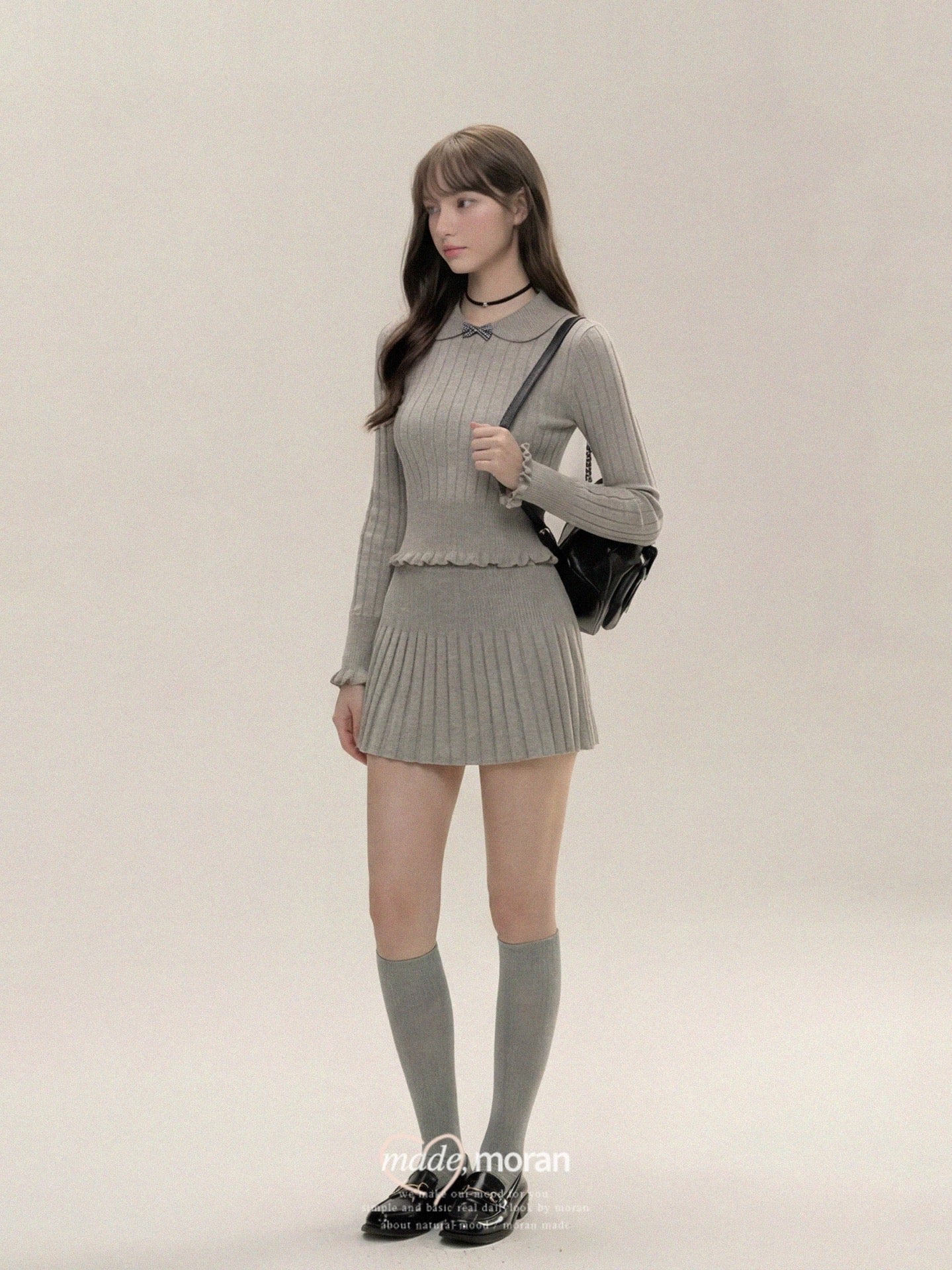French-style gray knitted skirt suit for women, autumn and winter 2025 new style, super beautiful pleated short skirt suit