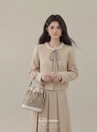 Korean-style heiress-inspired two-piece set with bow, women's autumn and winter wool short coat and pleated skirt, high-end fashion.