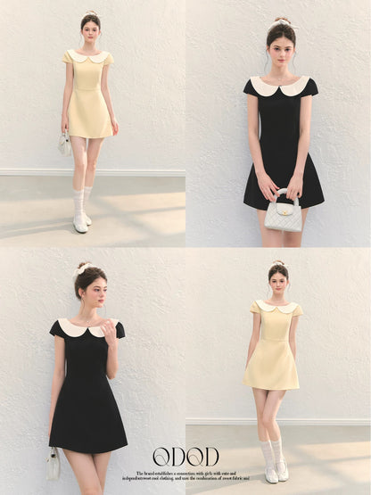 QDQD A-line dress with a Hepburn-inspired doll-face design, perfect for summer. Slimming, flattering, and with a French-inspired A-line silhouette.