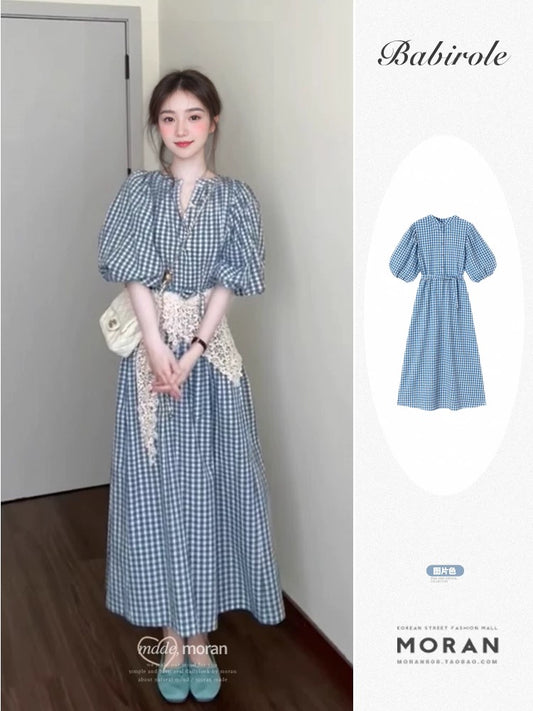 2025 summer new French style high-end seaside vacation strappy long skirt design blue plaid dress