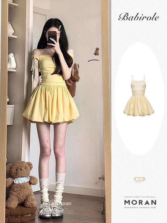 French beautiful yellow dress female sling goose yellow puffy skirt temperament bud skirt female design sense petite summer