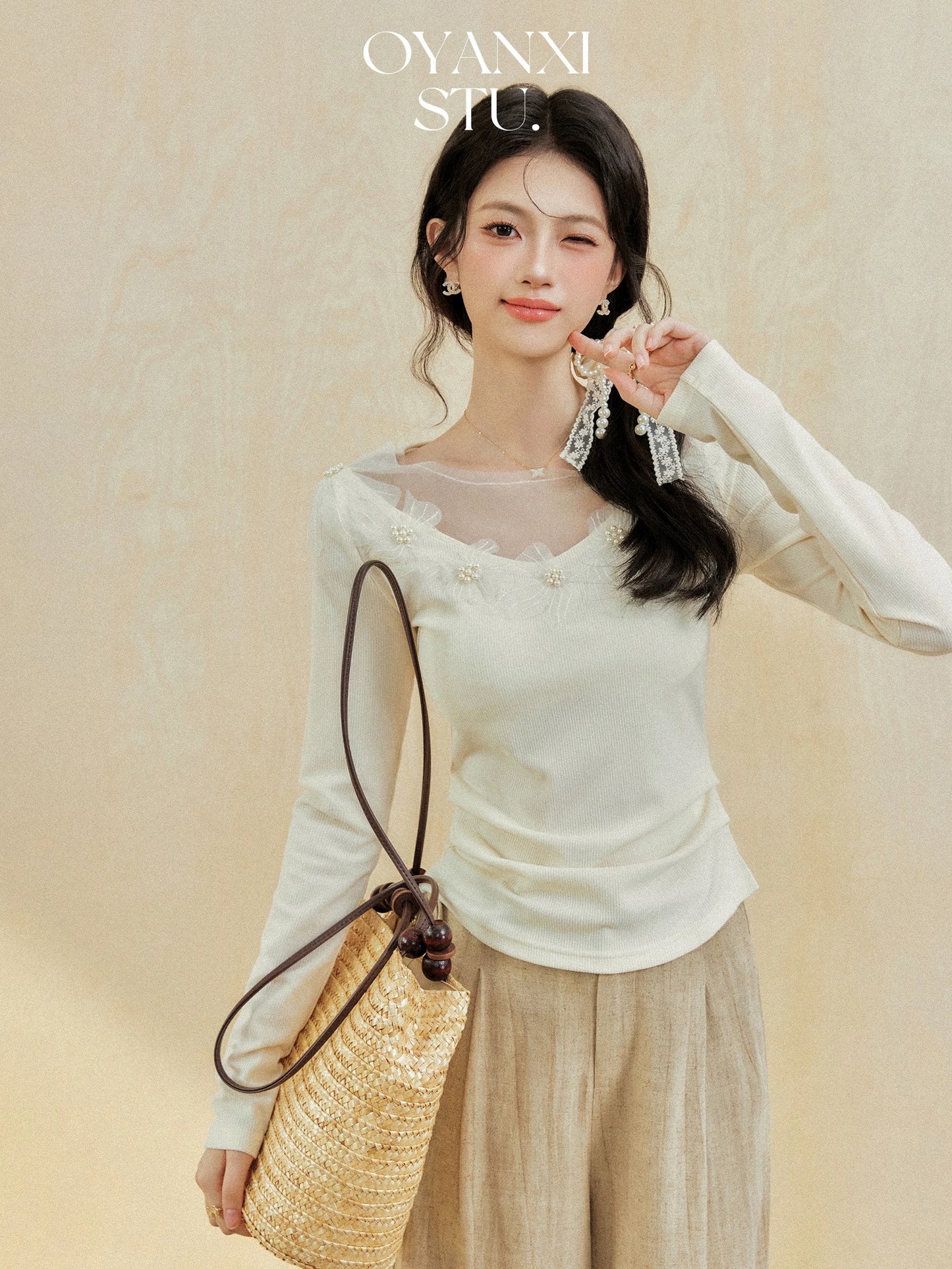 Ouyang Xi's "Gentle Nirvana" early spring design splicing long-sleeved T-shirt top temperament slimming T-shirt