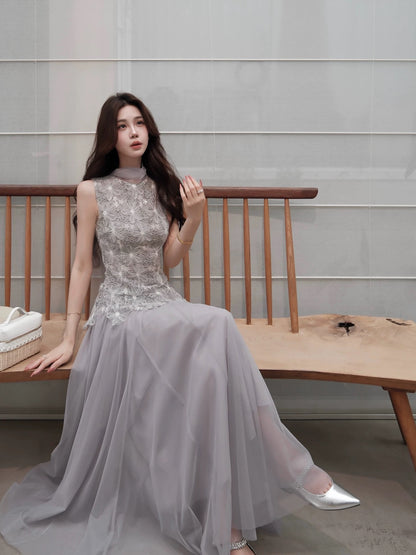 Mu Zili's stunning grey-blue tulle skirt, a luxurious and sophisticated flowing mesh midi skirt with a full hem, perfect for summer.