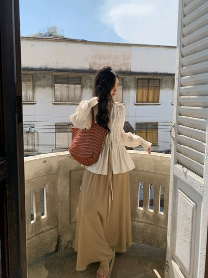 Ren Xiaoyi's design niche gathered strappy shirt for women 2024 spring and autumn new V-neck see-through sun protection shirt