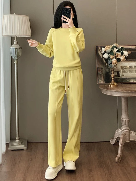 Ins style wear a complete set of women's 2025 autumn age-reducing stylish yellow sweater casual sports wide-leg pants two-piece set