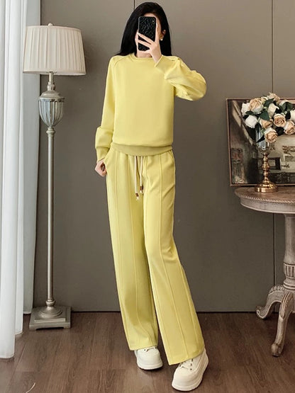 Ins style wear a complete set of women's 2025 autumn age-reducing stylish yellow sweater casual sports wide-leg pants two-piece set