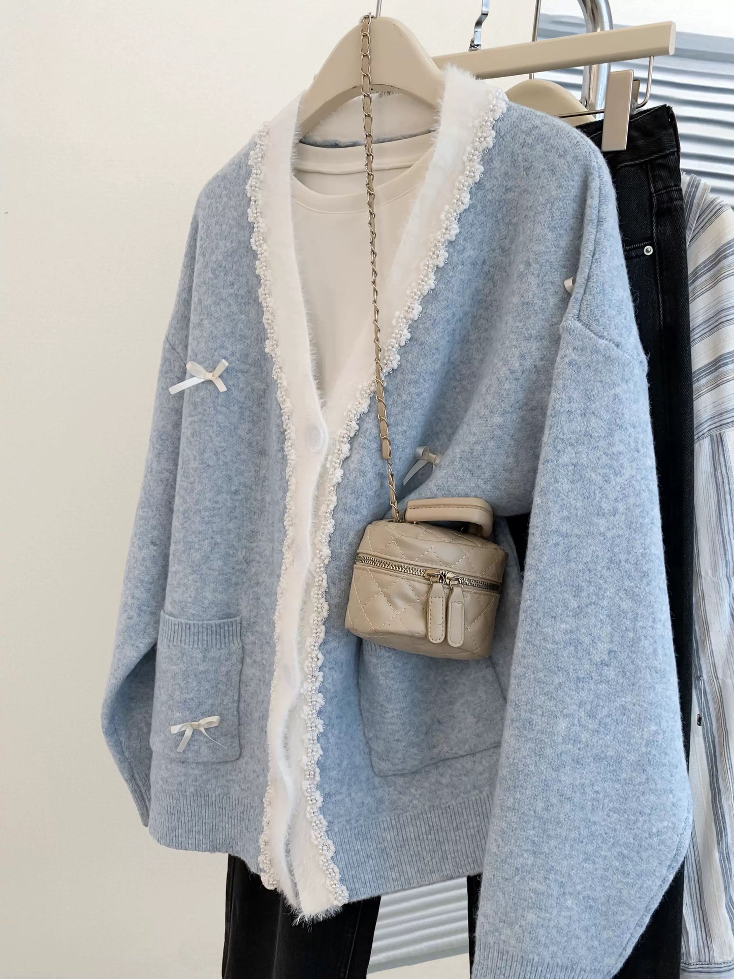 Blue v-neck bow cashmere sweater jacket for women 2025 winter French style loose high-end knitted cardigan outer wear