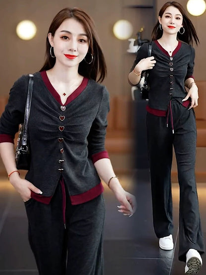 Fashionable casual sports suit for women in autumn new fashionable age-reducing and slimming fake two-piece V-neck long-sleeved trousers two-piece set