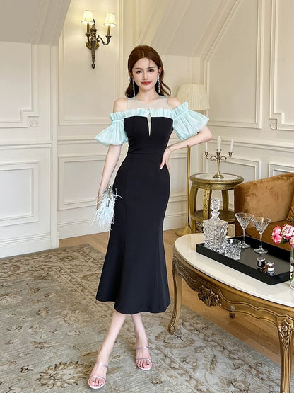 French pure one-shoulder dress female 2025 summer temperament puff sleeve black waist medium-length fishtail skirt