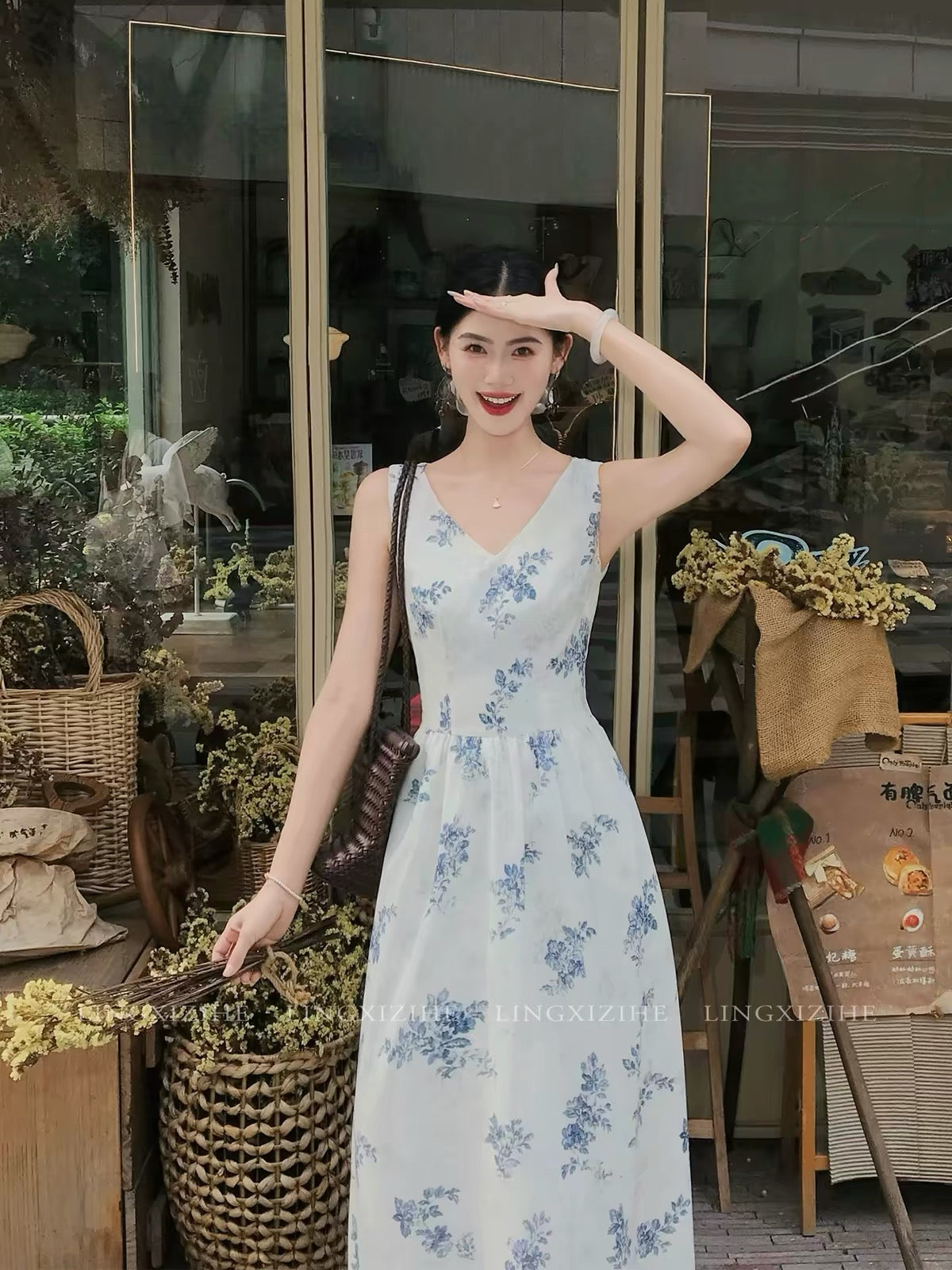 Ling Qian Zi He – French-style blue floral embroidered dress; a summer maxi dress featuring a bow-tie detail.
