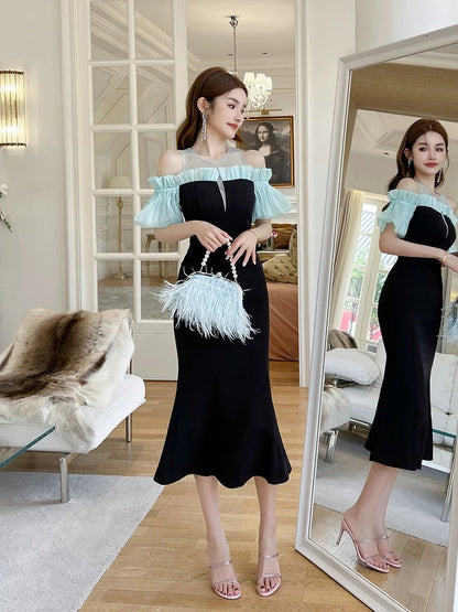 French pure one-shoulder dress female 2025 summer temperament puff sleeve black waist medium-length fishtail skirt