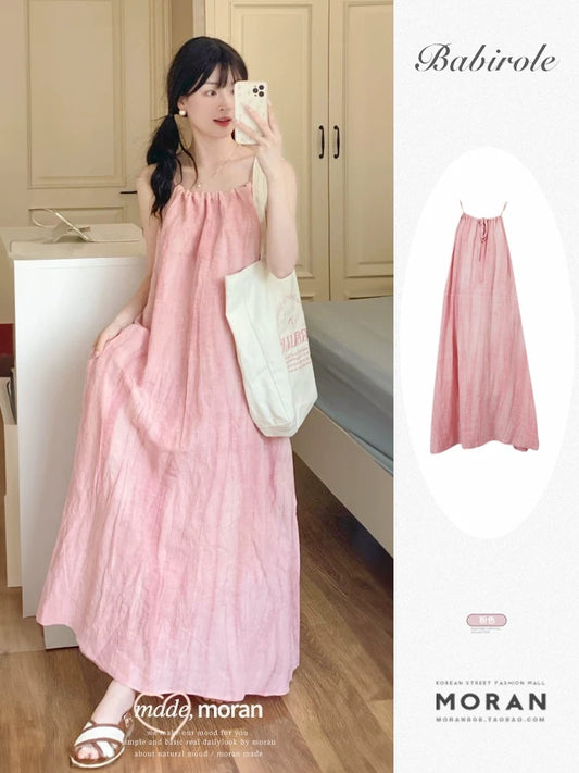 Summer pink halterneck suspender dress for women, loose, lazy, casual, slim, large swing skirt, sleeveless long skirt, holiday style