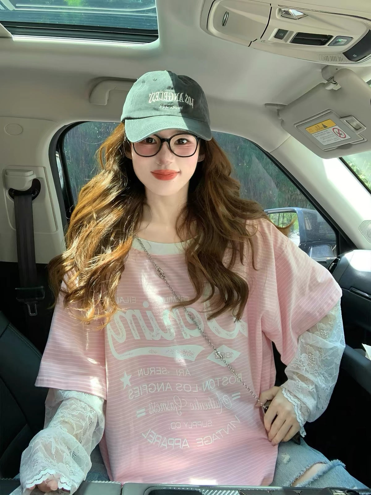 Women's "faux-layered" striped long-sleeve top with an asymmetrical off-shoulder design—a new 2026 autumn style featuring American-style letter prints and lace paneling.