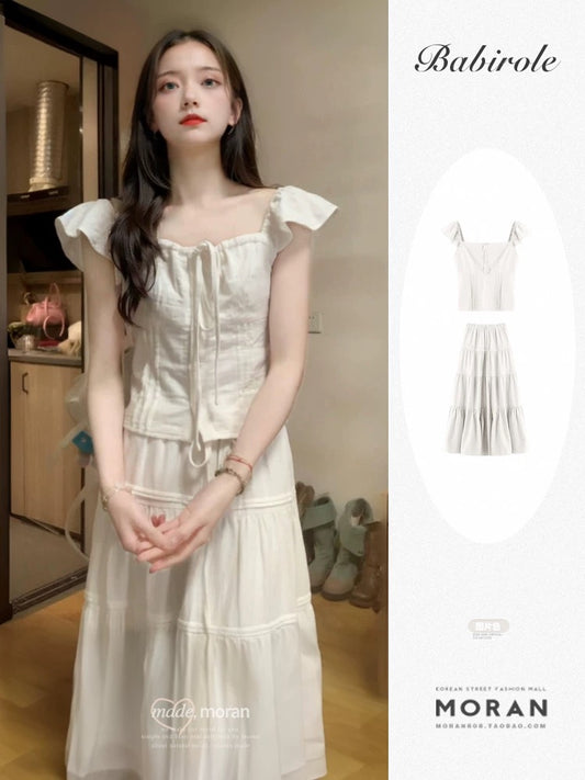 A complete set of summer clothes for girls with a sense of first love, sweet little flying sleeves tops and skirts, two-piece suits for small people