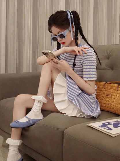 A and sassy suit with a sense of atmosphere. A complete set of sweet and spicy college-style short-sleeved tops and puffy skirts.