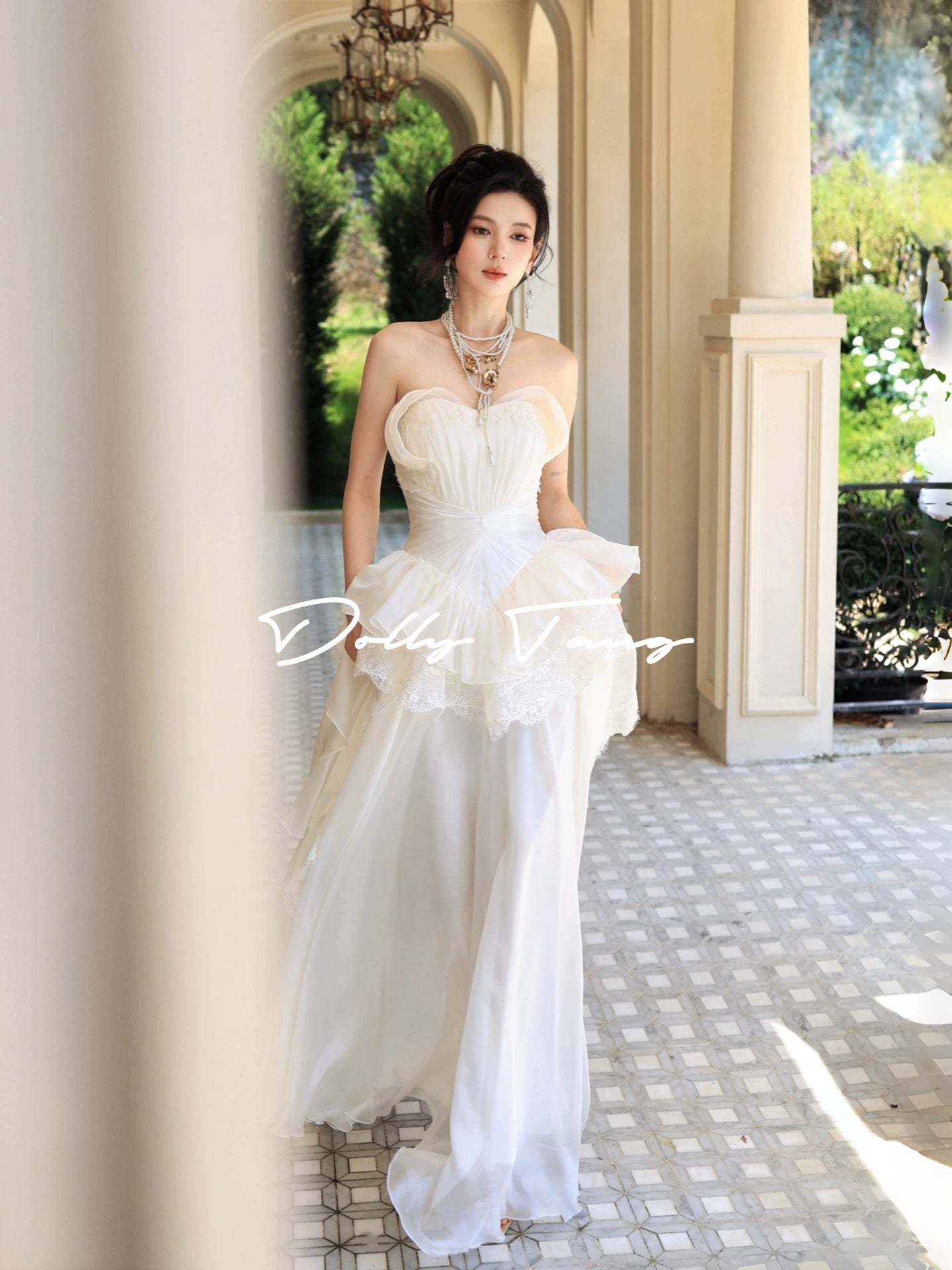 Dollytang designer hand-pleated strapless dress with layered lace details, a vintage-inspired gown.