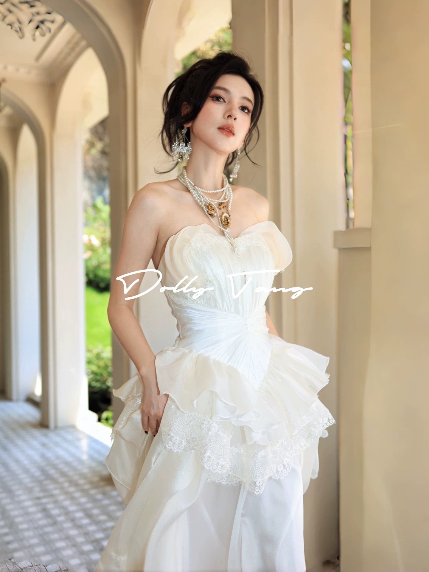 Dollytang designer hand-pleated strapless dress with layered lace details, a vintage-inspired gown.