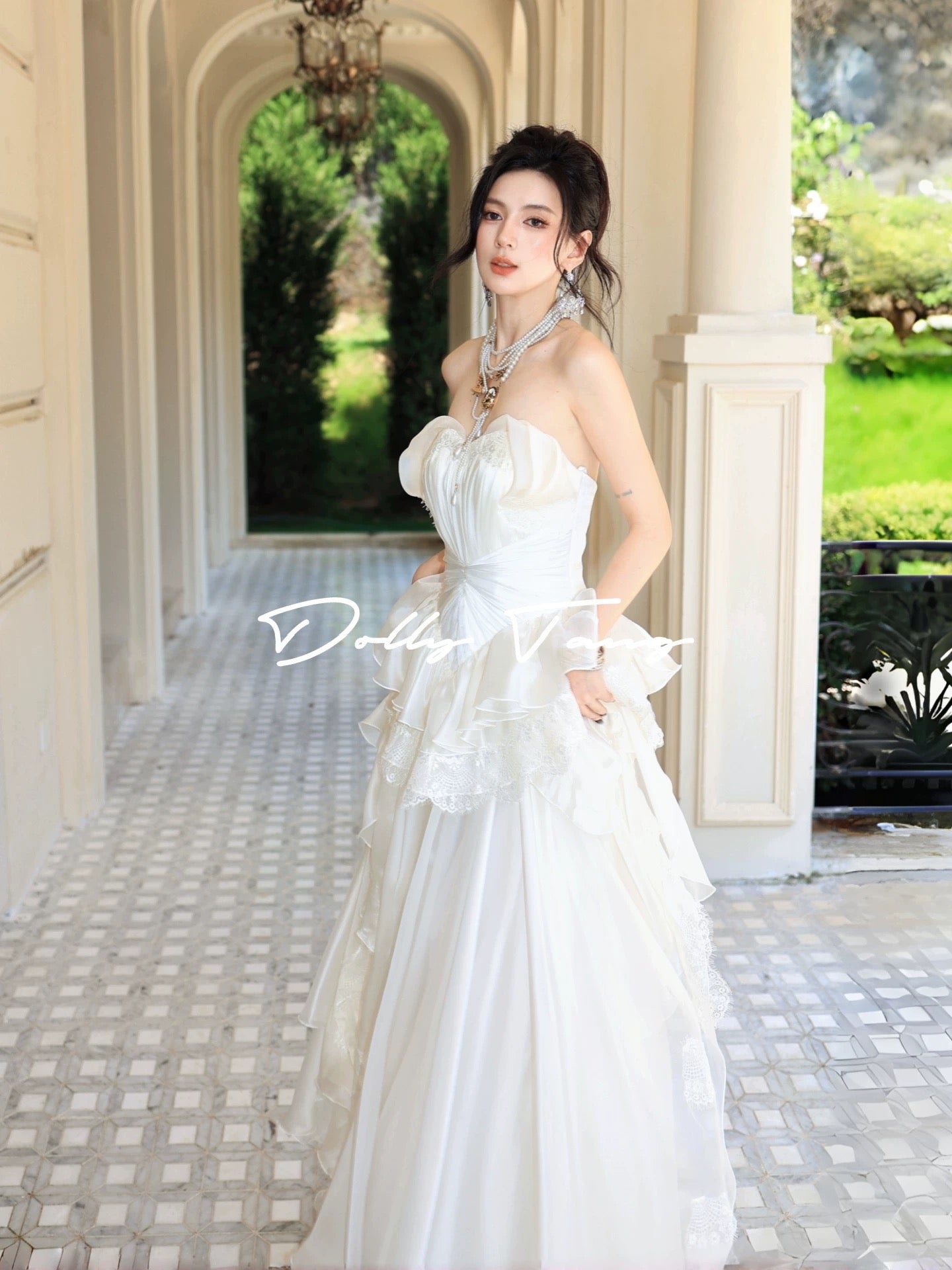 Dollytang designer hand-pleated strapless dress with layered lace details, a vintage-inspired gown.