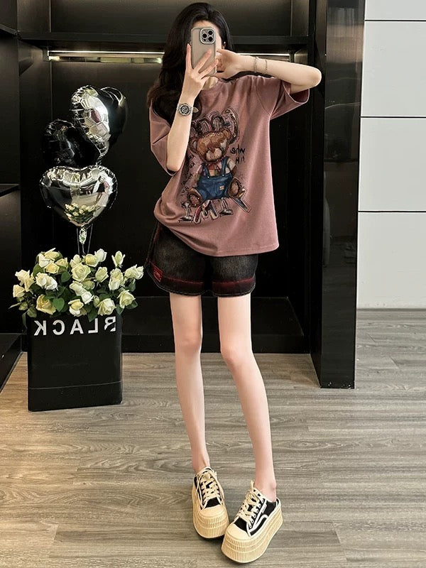 Fashionable and age-reducing leisure sports suit for women in summer, playful and cute, slimming short-sleeved T-shirt and denim shorts, two-piece suit