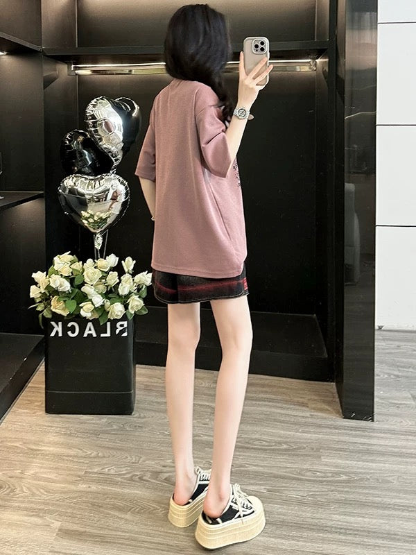 Fashionable and age-reducing leisure sports suit for women in summer, playful and cute, slimming short-sleeved T-shirt and denim shorts, two-piece suit