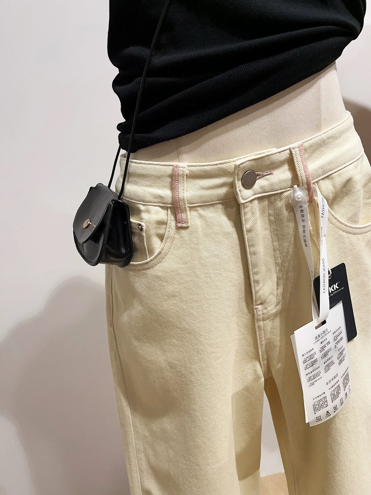 Casual high-waisted wide-leg jeans for women, loose fit, slimming, creamy yellow straight leg pants for spring and autumn.