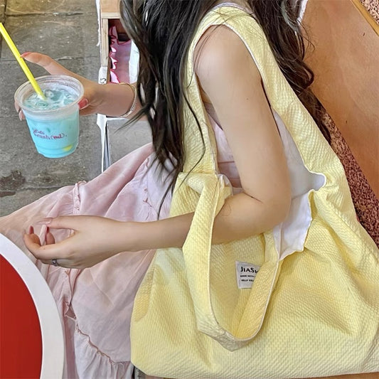 Japanese ins cream yellow summer cute and sweet college student shopping bag large capacity solid color single shoulder canvas bag for women