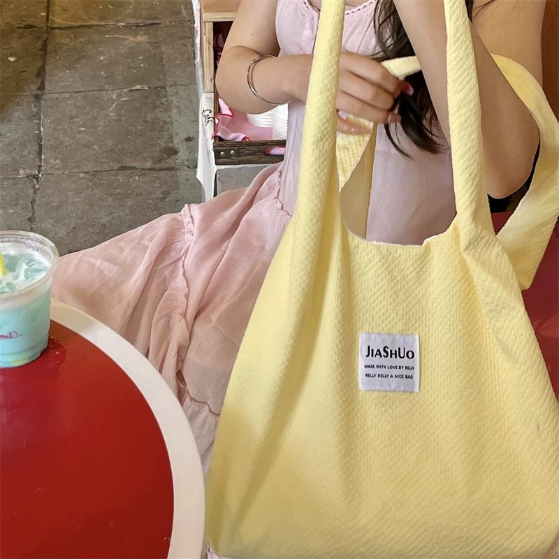Japanese ins cream yellow summer cute and sweet college student shopping bag large capacity solid color single shoulder canvas bag for women