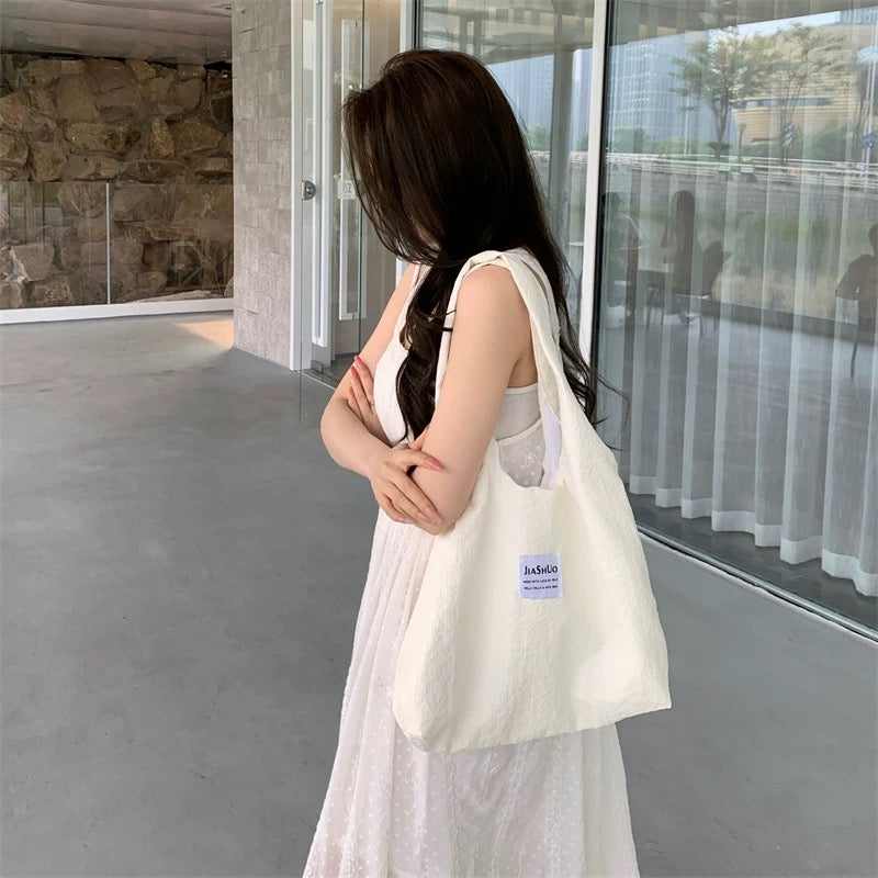 Japanese ins cream yellow summer cute and sweet college student shopping bag large capacity solid color single shoulder canvas bag for women