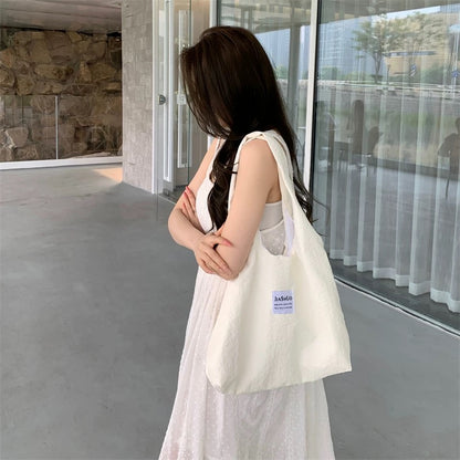 Japanese ins cream yellow summer cute and sweet college student shopping bag large capacity solid color single shoulder canvas bag for women