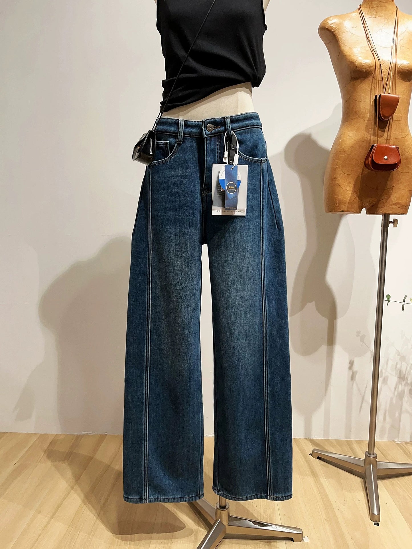 Casual high-waisted wide-leg jeans for women, slimming straight leg pants with fleece lining, perfect for winter.