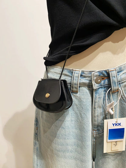 High-end retro high-waisted curved jeans for women, loose fit, slimming cropped pants for spring.