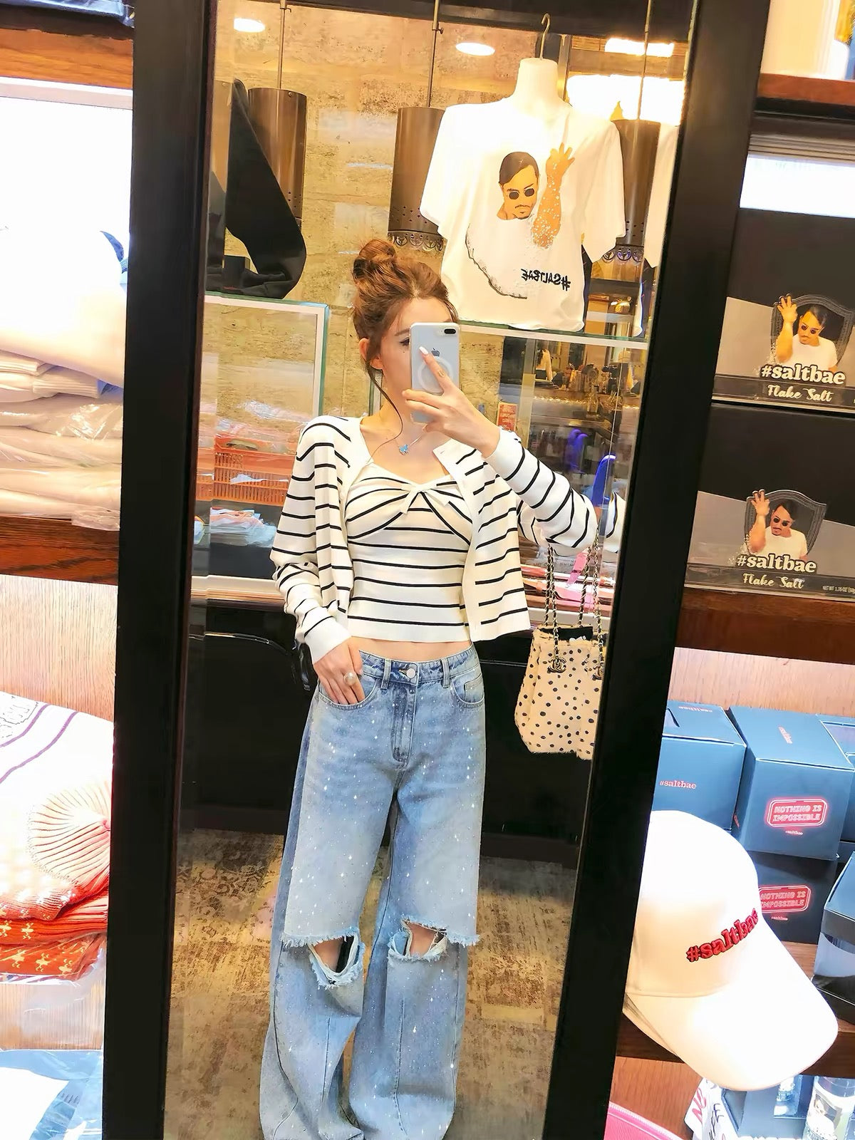 Li Wanjun "Galaxy Rhinestone Jeans" – High-quality denim featuring 78% cotton, intricate hot-fix rhinestone detailing, and distressed knee cutouts.