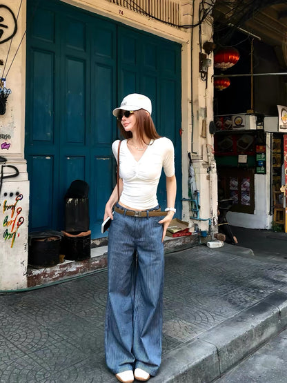 Li Wanjun "Striped Aesthetic Trousers" – A "90% Cotton" design featuring vertical stripes, a straight-leg cut, and a relaxed, slimming fit.
