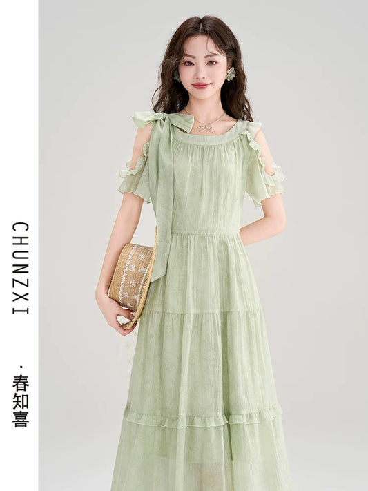 Chun Zhixi French style seaside photo taking beautiful bow dress for women summer new waist slimming temperament long dress