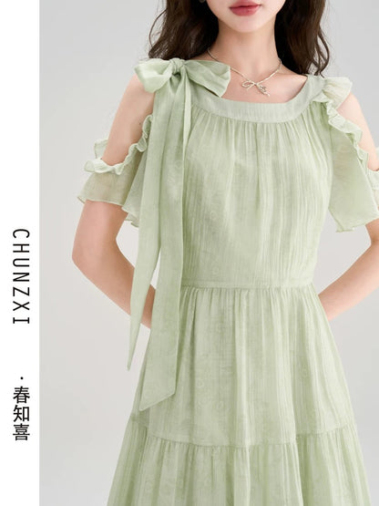 Chun Zhixi French style seaside photo taking beautiful bow dress for women summer new waist slimming temperament long dress