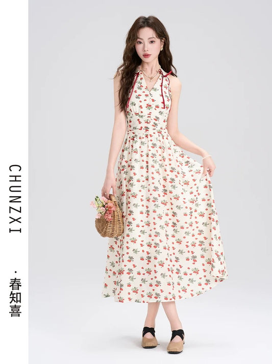 Chun Zhixi seaside holiday style halter neck backless floral dress female summer new waist slimming A-line long skirt