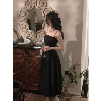 White sling dress women's summer 2023 new tea break French temperament waist slimming long skirt