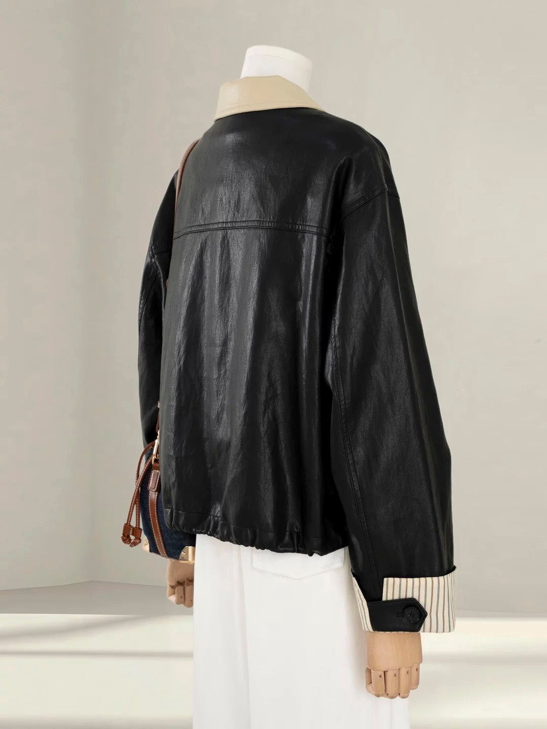 High-grade black contrast lapel leather jacket for women, petite 2025 autumn new street-fashionable PU leather jacket