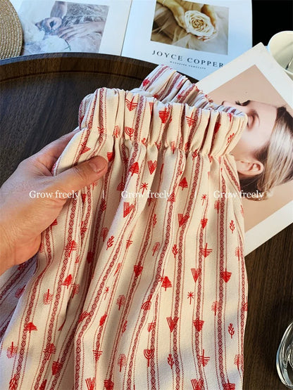 Grow freely! Red vertical striped wide-leg pants for women, perfect for summer. Relaxed fit, slimming straight leg.