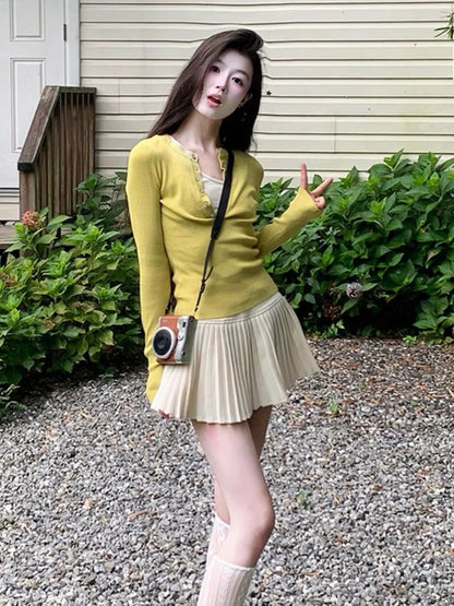 Early spring outfit: dopamine yellow fake two-piece slim long-sleeved sweater top and skirt two-piece suit