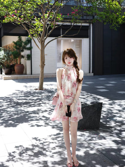 ChillJoying "Rose & Lily" – A charming, sleeveless, halter-neck chiffon dress featuring a delicate floral print and a "faux two-piece" layered design.