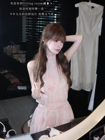 ChillJoying "Rose & Lily" – A charming, sleeveless, halter-neck chiffon dress featuring a delicate floral print and a "faux two-piece" layered design.
