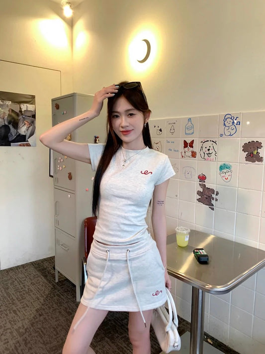 Right shoulder short-sleeved T-shirt petite suit for women summer high waist drawstring hip A-line skirt short skirt sweet hot girl two-piece set