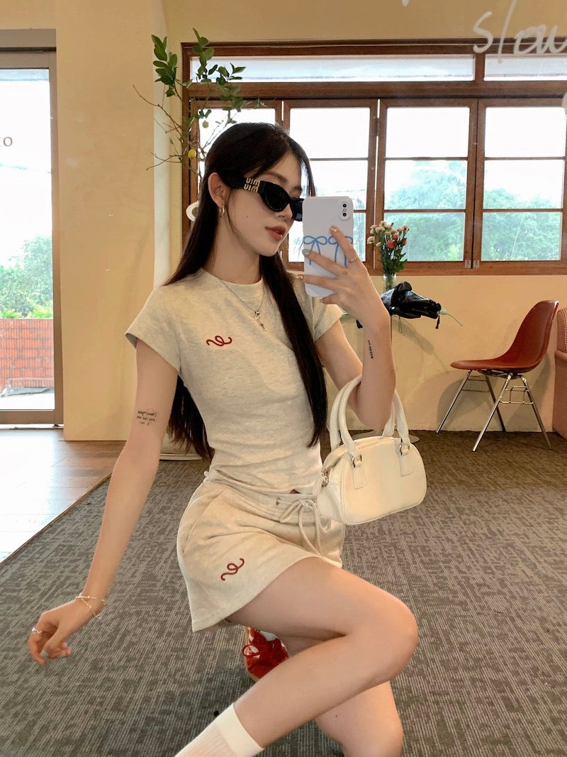 Right shoulder short-sleeved T-shirt petite suit for women summer high waist drawstring hip A-line skirt short skirt sweet hot girl two-piece set