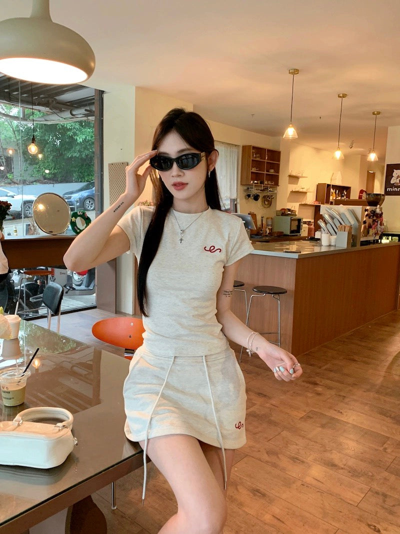 Right shoulder short-sleeved T-shirt petite suit for women summer high waist drawstring hip A-line skirt short skirt sweet hot girl two-piece set