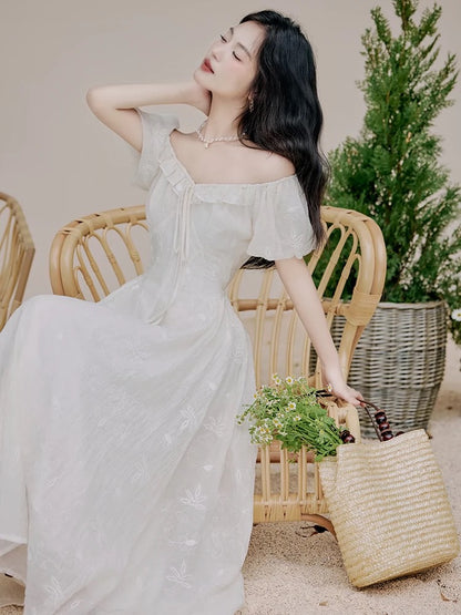 Tea break French dress summer 2024 new style chic and beautiful temperament super fairy high-end Hepburn style little white dress