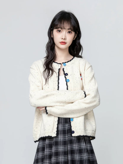 Color-blocked round neck knitted cardigan for women, 2026 spring and autumn new style, cartoon embroidered sweater jacket, short top.