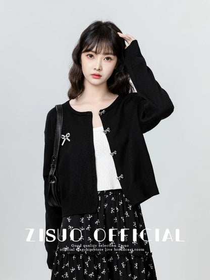 Women's black knitted cardigan, spring and autumn 2026 new style, niche design, slimming sweater, short top.