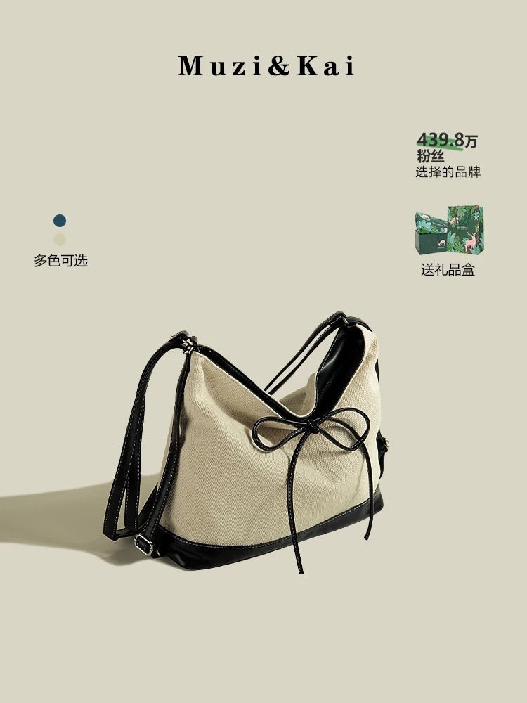 MuziKai large capacity tote bag female 2025 new bow fashion stitching texture multifunctional backpack