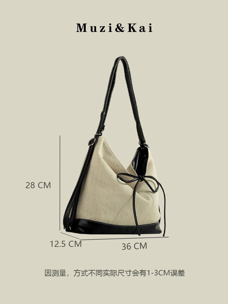 MuziKai large capacity tote bag female 2025 new bow fashion stitching texture multifunctional backpack
